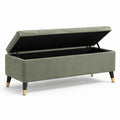 Banc de rangement en tissu vert avec pieds en bois de hêtre et métal 120cm