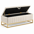 Banc de rangement en tissu beige avec structure métallique dorée 120 cm