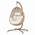Chaise suspendue en rotin synthétique avec coussins crème